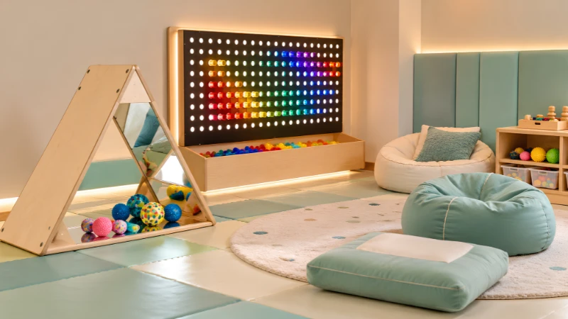 Sensory room equipment including a mirror station, light panel and tactile toys